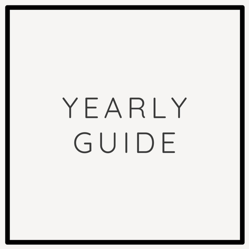 Square graphic with a black square outline and "yearly guide" in the center